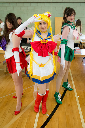 Hall cosplay photo. Sailor Mars, Sailor Moon and Sailor Jupiter.